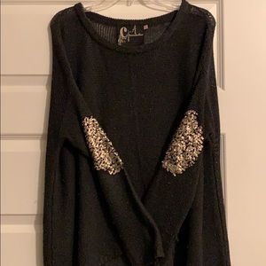 Knit sweater with elbow detail